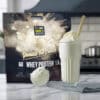 VANILLA-WHEY-PROMO-BAG-WITH-ICE-CREAM-AND-GLASS-MILKSHAKE